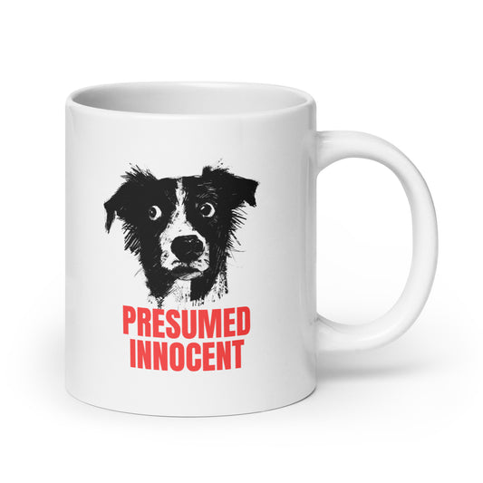 Illustration of a dog with the text “Presumed Innocent” in bold red letters, printed on a high-quality mug